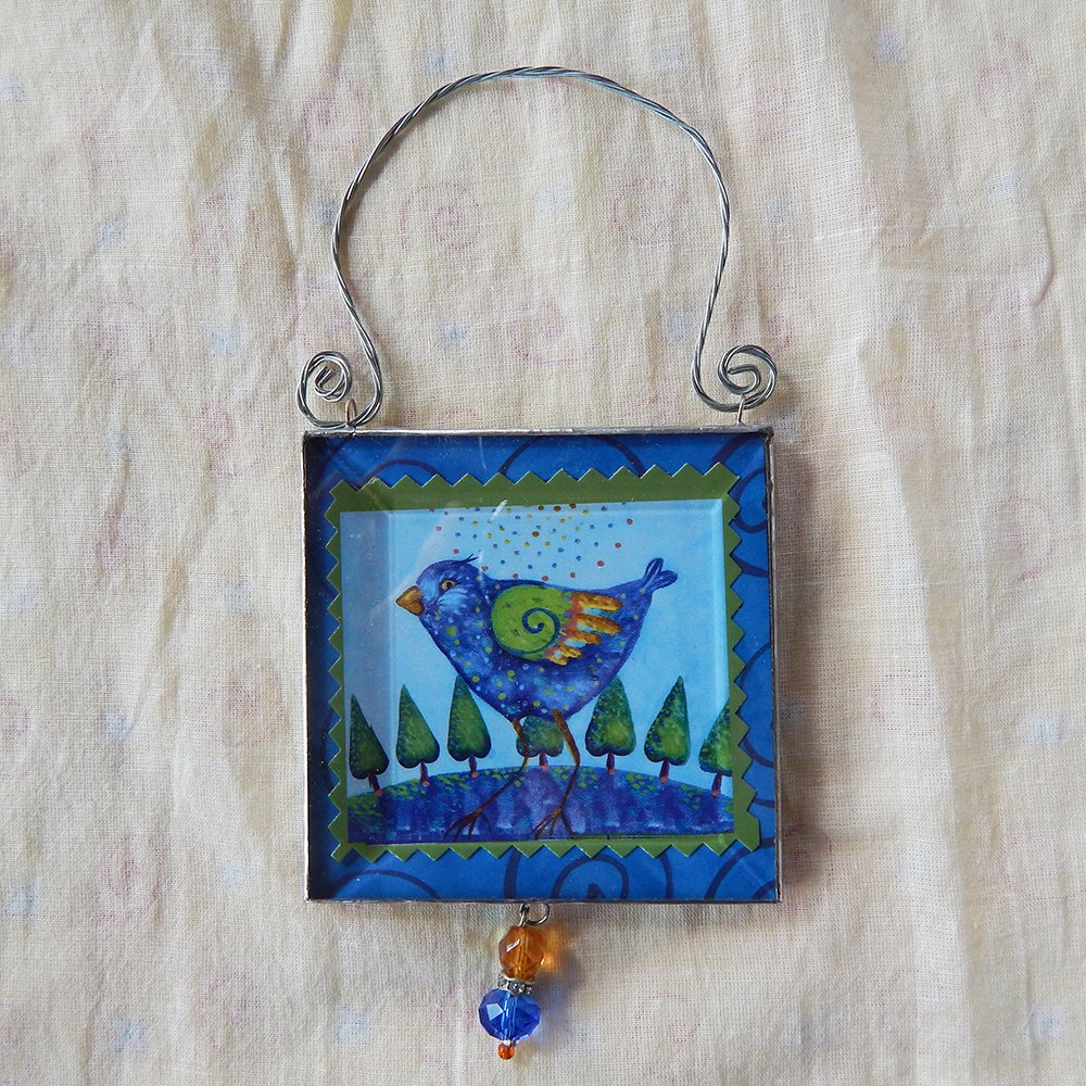 Danasimson.com double sided ornament Release your creative bird front